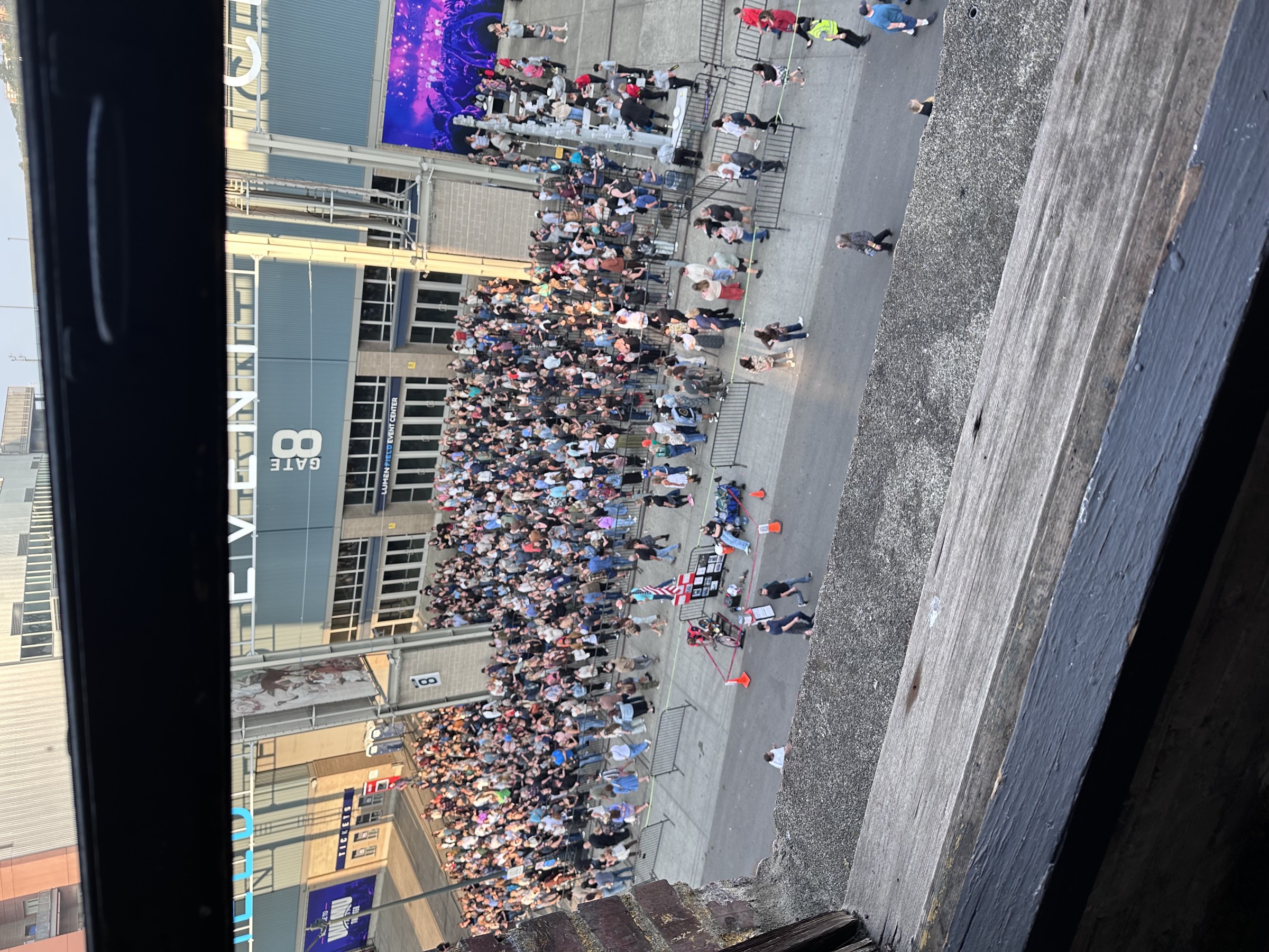 View from the studio window down to the busy street and Lumen Field entrance below